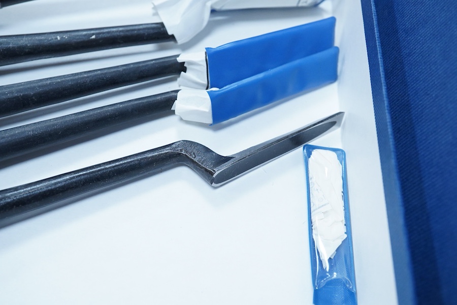 Four sets of Japanese chisels, including a set of six Kote Nomi cranked neck trowel chisels, a set of seven mortise chisels, and two other cabinetmakers sets (22 in total), plus two Japanese hammers/mallets